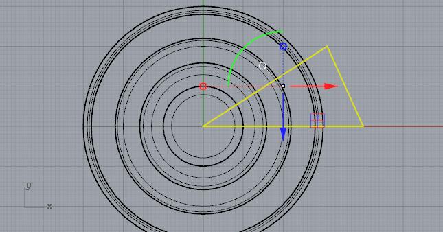 Top-down view of pedestal with yellow triangle intersecting ring on top