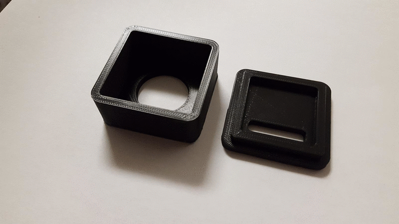 two images showing the 3D printed speaker case opened up and the speaker case with the speaker inside.