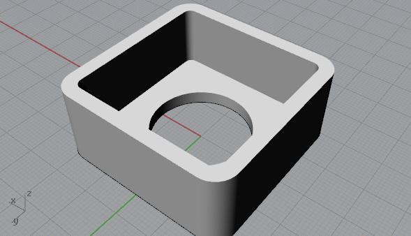 open box-like container with circle in the bottom