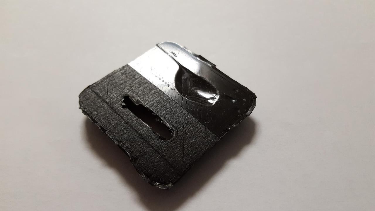 3D printer piece with odd divot removed from it