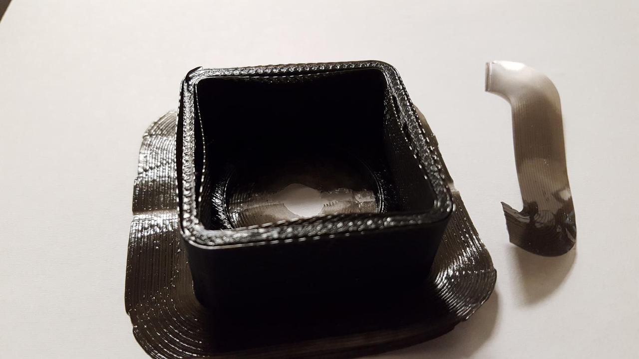 poorly 3D printed speaker that looks blob-like and flimsy