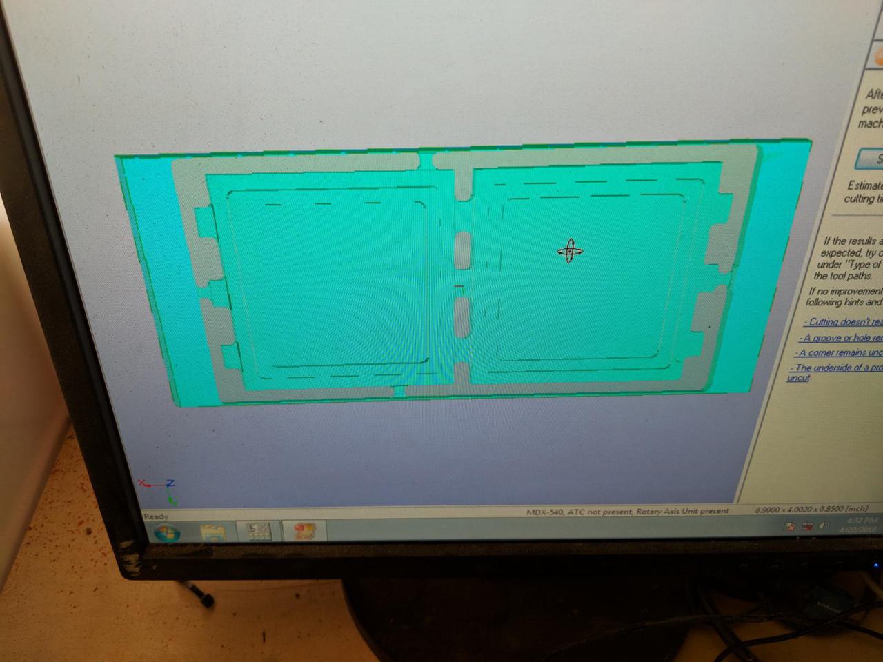 computer monitor showing 3D image of properly milled box with cuts all around the sides.