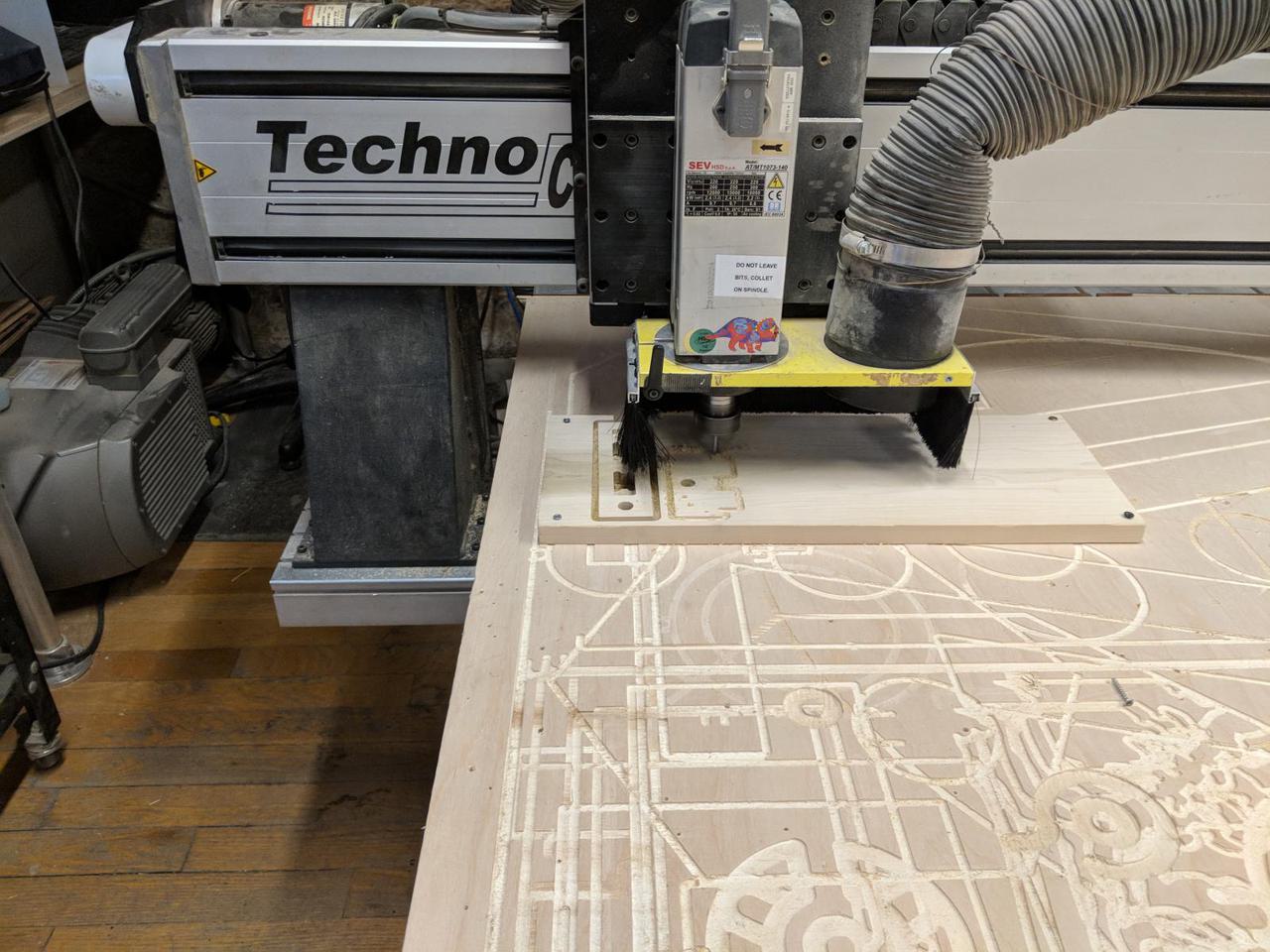 CNC cutting into rectangle piece of wood