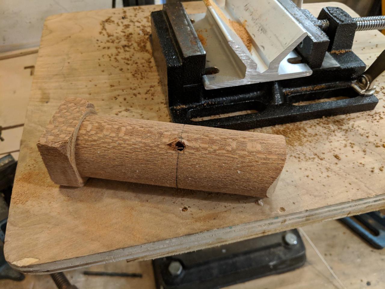 round lacewood with small hole drilled through center