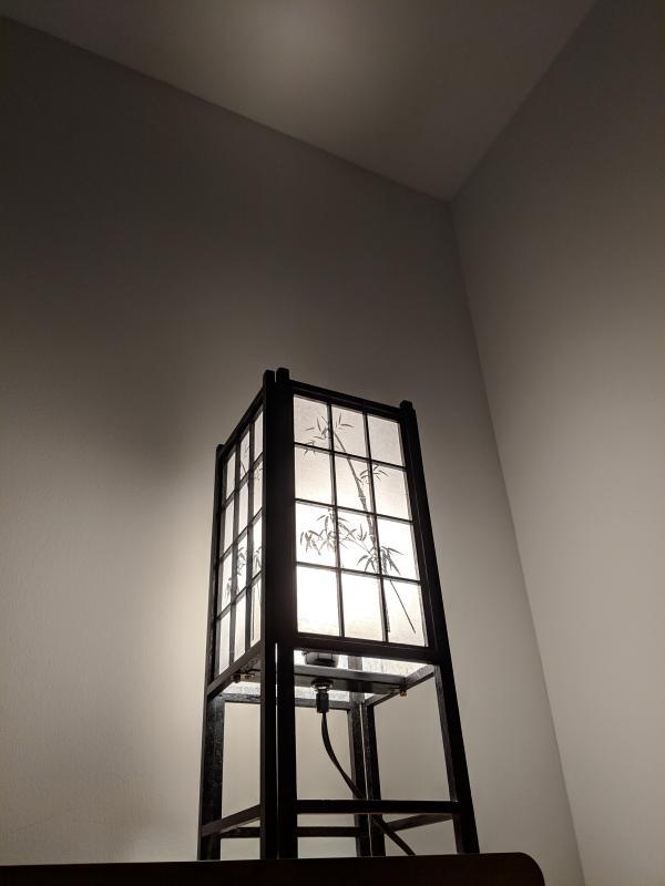 Table desk shining a bright light onto the wall