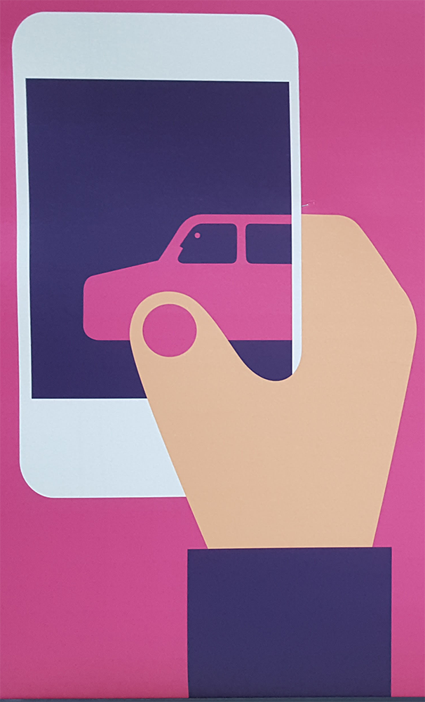 Hand holding phone, with car on phone screen. The car is lined up with the hand so that the car looks like fingers.