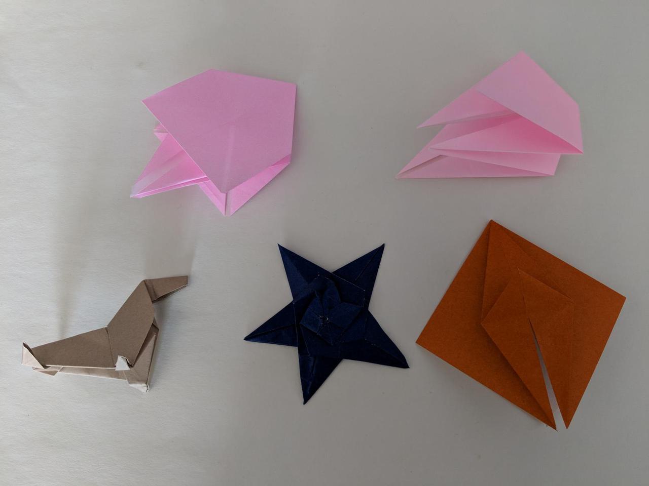 origami seal, five pointed star, and origami base shapes, demonstrating basic starting configurations.