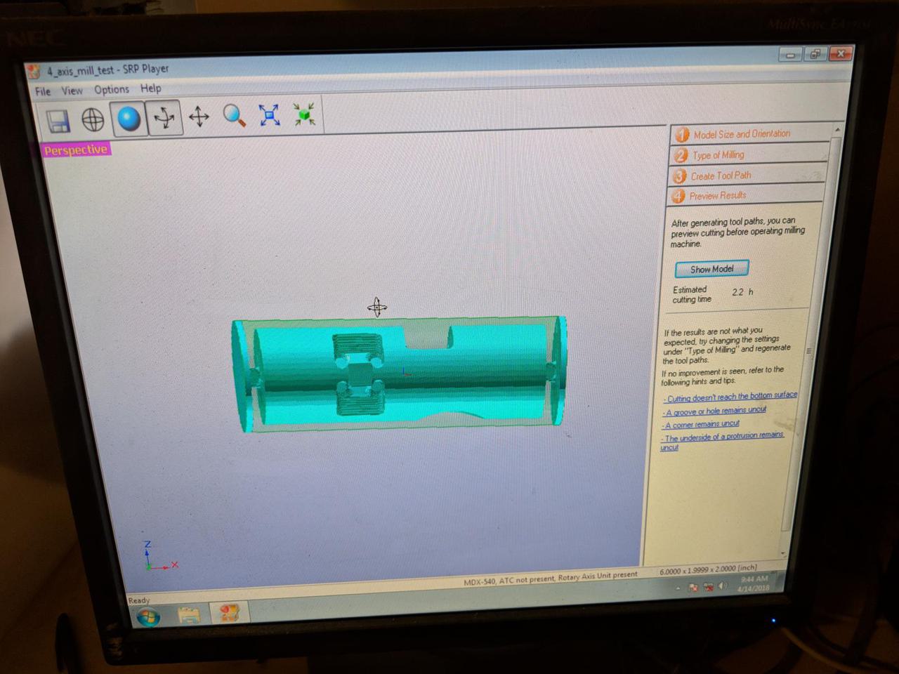 computer screen with model of cylinder with pieces cut out of it